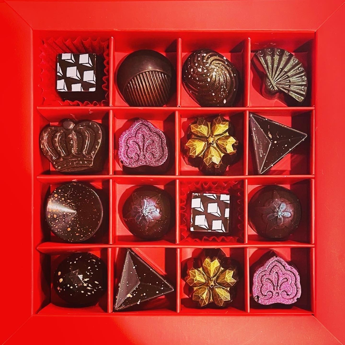Example 16-piece Le Rouge truffle box; individual chocolates vary with your selection