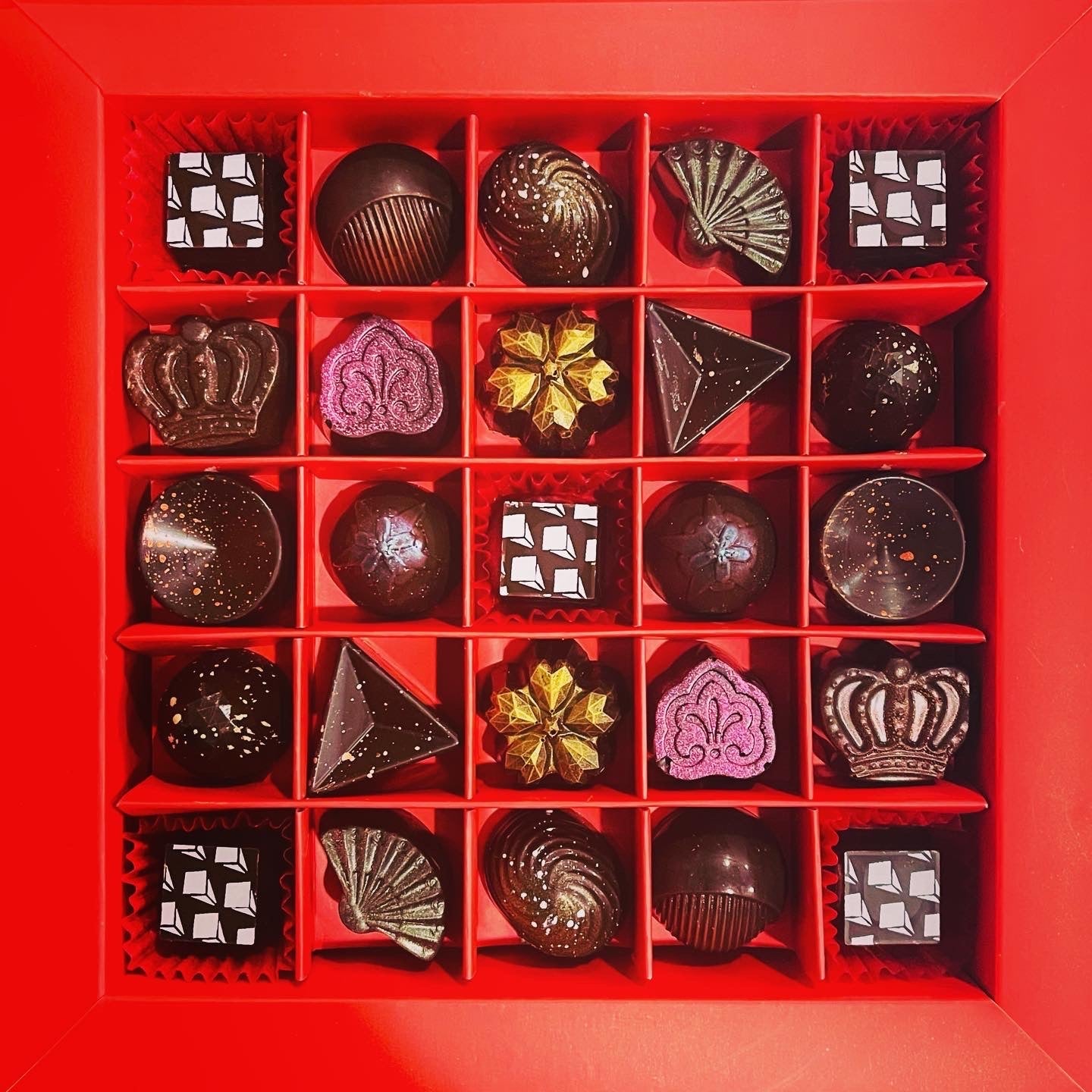 Example 25-piece Le Rouge truffle box; individual chocolates vary with your selection